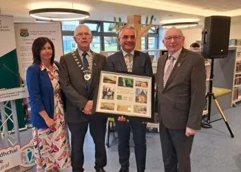Officials greet Minister Dara Calleary TD on April 24.