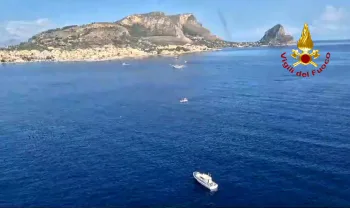 An Italian Coast Guard ship is seen at the site of the sunken vessel on near Palermo. Photograph: Corpo Nazionale dei Vigili dei del Fuoco via Getty