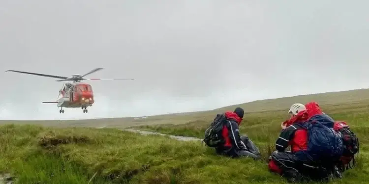 Rescuers await the departure of the Coast Guard helicopter following the handover of the casualties at Benbulbin (Pic: SLMRT responder D Barnes)